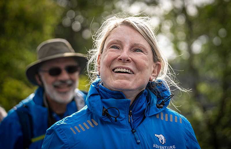 Adventure Canada - Happy woman in blue jacket