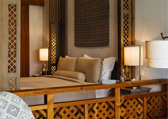 Bhutan Spirit Sanctuary, Paro - balcony room, image of bed area