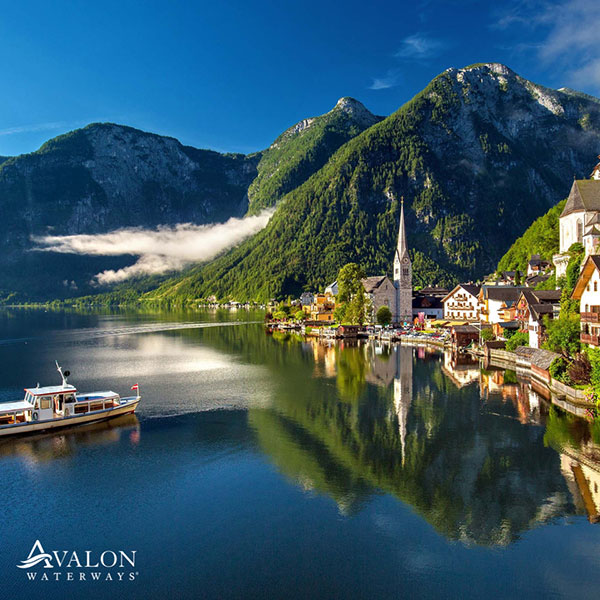 Avalon Waterways - Mountain Range with lake and small village on shore